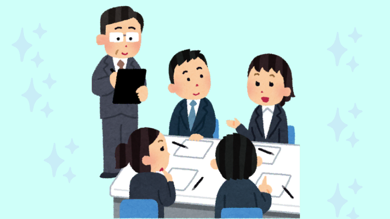 Manager addressing a team at a table — best career options for teachers